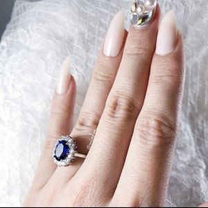 Blue sapphire and gemstone ring